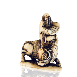 Japon, netsuke en ivoire Rô-shi sur son bœuf, Masatsugu, 19e